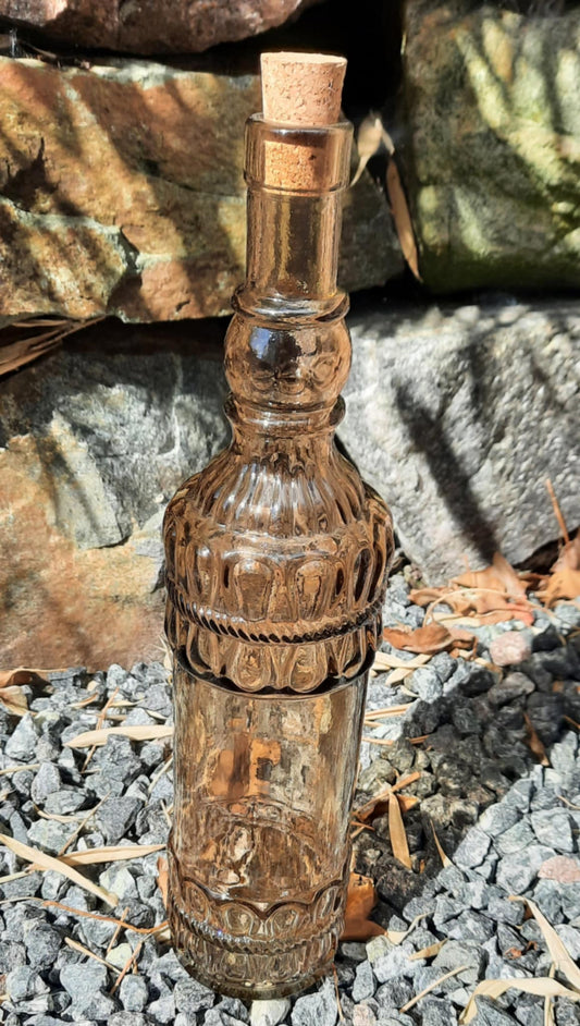 Flaske i resirkulert glass.